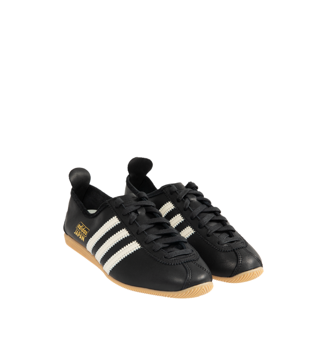 Image 2 of 5 - BLACK - ADIDAS Japan Sneaker featuring regular fit, laces, leather upper, leather lining, rubber outsole, low-profile T-toe design and signature archive branding.