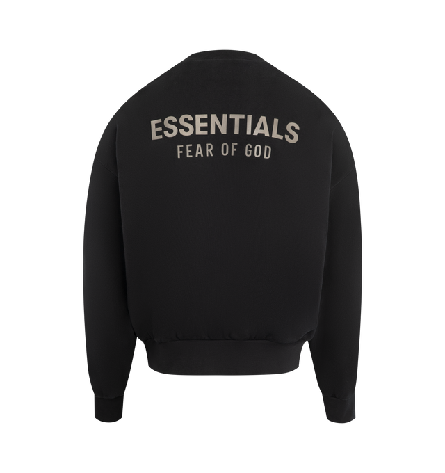 Image 2 of 2 - BLACK - FEAR OF GOD ESSENTIALS Classic Fleece Crewneck made from 380gsm core fleece featuring a classic fit with signature Fear of God relaxed proportions. A new "Essentials Fear of God" beveled metallic logo is branded across the back. Details include rib-knit collar, cuffs, and waist-hem. A "Fear of God Essentials" rubberized label is stitched on the sleeve. 80% cotton, 20% polyester fleece.