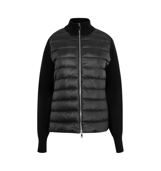 Image 1 of 3 - BLACK - MONCLER Padded Wool Zip-Up Cardigan featuring an attached drawstring hood, front zip closure, channel-quilted body, ribbed cuffs and hem, zip pockets, flap sleeve pocket, and logo patch detail. Lined body and hood. 100% polyamide/nylon. Padding: 90% down, 10% feather.