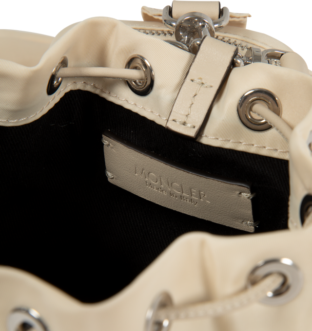 Image 3 of 3 - WHITE - MONCLER Double Pouch Top Handle Bag featuring two-way top-zip closure, drawstring closure, removable top carry handle and adjustable wristlet straps. Textile/leather.