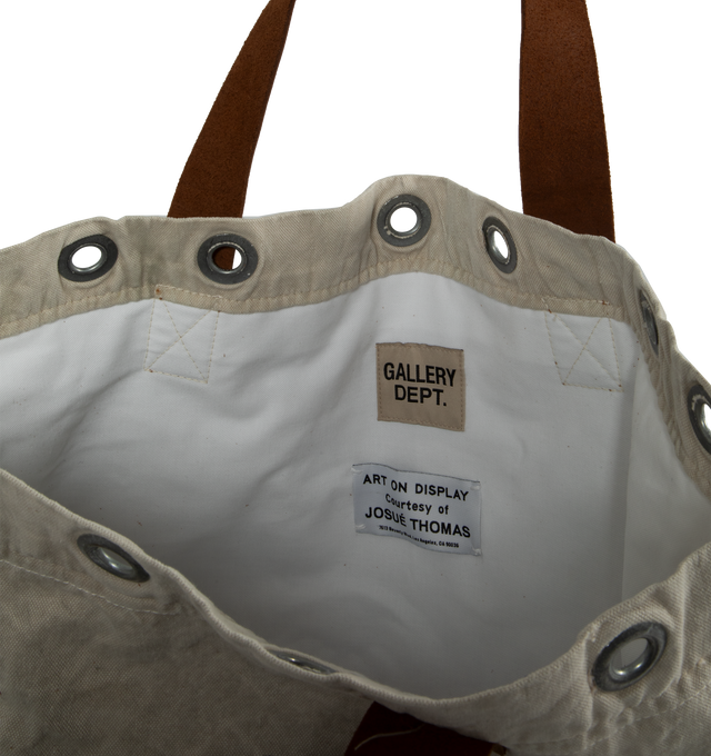 Image 3 of 3 - NEUTRAL - GALLERY DEPT. TOOL TOTE featuring copper grommets, leather upholstery, canvas, Le Bar D Music De La Galerie logo and property of Gallery Dept. stamp. 100% cotton canvas. 