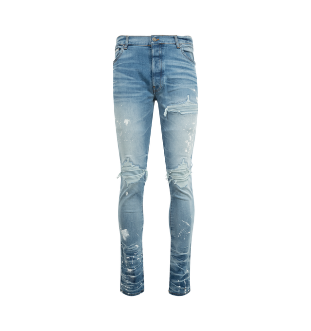 Image 1 of 3 - BLUE - AMIRI Painter Denim MX1 Jeans featuring destroyed light-wash denim, regular rise, five-pocket style, fitted through skinny legs, button zip fly and belt loops. Cotton/elastane. Made in Italy.
