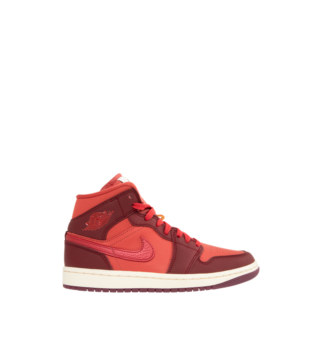 Image 1 of 5 - RED - JORDAN Air Jordan 1 Mid SE Sneaker featuring leather in the upper, encapsulated Nike Air-Sole unit provides lightweight cushioning, rubber in the outsole, lace closure, wings logo on collar and Jumpman on tongue.