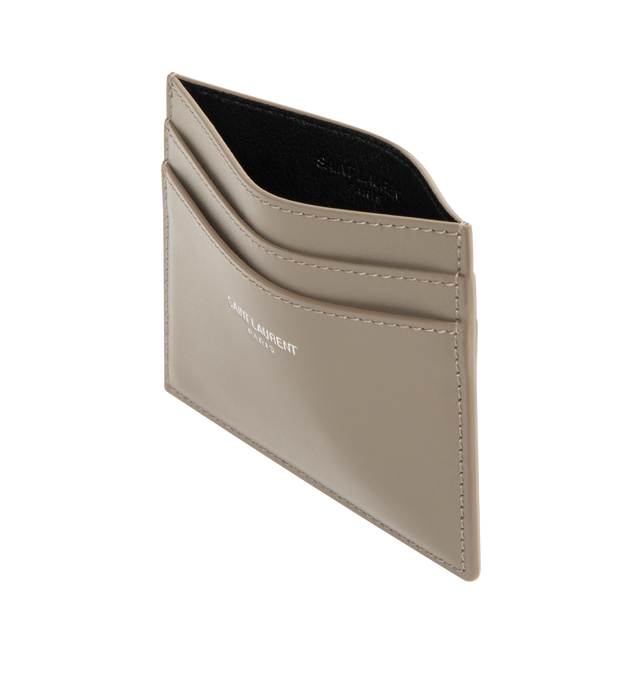 Image 3 of 3 - BROWN - SAINT LAURENT Card Case featuring embossed Saint Laurent Paris signature, leather lining, silver toned hardware and five card slots. 3.9" X 3.1" X 0.1". 100% calfskin leather.
