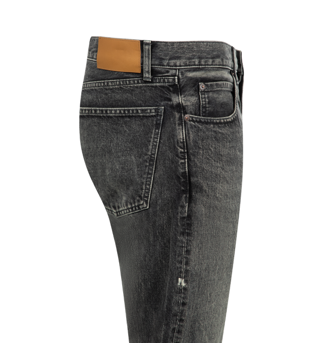 Image 3 of 3 - BLACK - SEEKINGS Slim Jeans featuring vintage wash with distressing throughout, 5 pocket styling, button fly, mid rise, slim leg, raw cut hem, leather patch on back of waistband and logo engraved hardware. 100% cotton. Made in Japan.