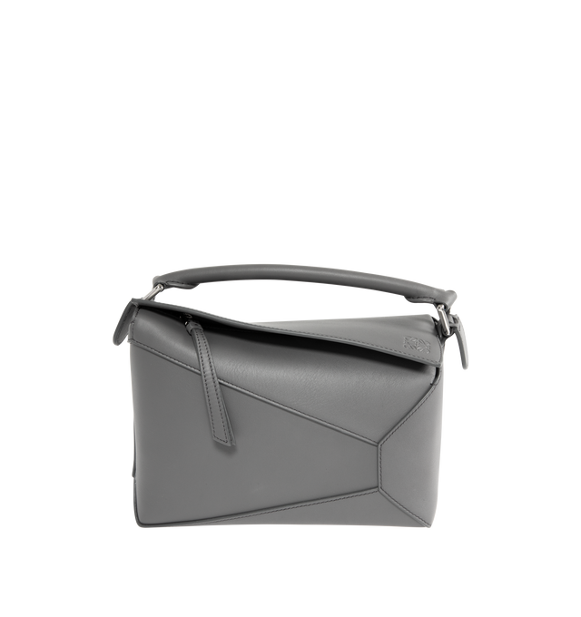Image 1 of 3 - GREY - LOEWE Small Puzzle Edge Bag in calfskin featuring geometric lines, cuboid form, overlapped panels with single stitch lines, shoulder, crossbody or hand carry, detachable and adjustable strap, zip closure with calfskin pull, one external zip rear pocket, one internal slip pocket, herringbone cotton canvas lining and embossed Anagram. Soft grained calf. 16.5 cm x 24 cm x 10.5 cm. Made in Spain.