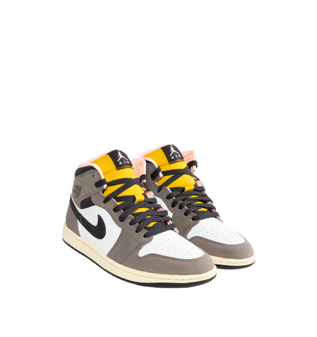 Image 2 of 5 - GREY - JORDAN Air Jordan 1 Mid SE Sneaker featuring genuine leather in the upper, Nike Air technology, soft foam midsole, rubber outsole, Jumpman on the tongue and wings logo on the collar.