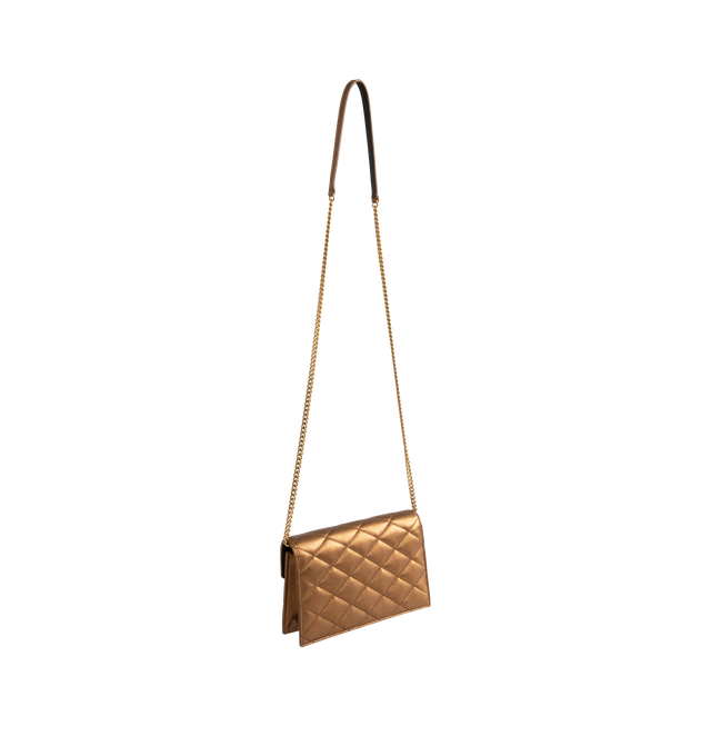 Image 2 of 4 - GOLD - Saint Laurent Women's Envelope Small YSL Wallet on Chain is crafted from metallic leather and features the house's iconic chevron quilting, a signature Cassandre logo, and a detachable leather-and-chain shoulder strap for versatile styling. This designer wallet on chain combines timeless elegance with everyday functionality, offering an envelope flap with snap closure, an interior zip pocket, and a slip pocket for organized essentials. Main Material: Metallic Leather. Hardware: Metal.