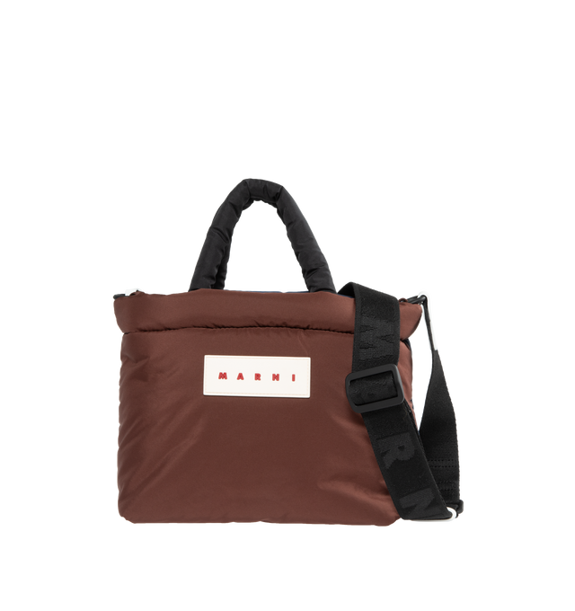 Image 1 of 3 - BROWN - MARNI Appliqud Padded Shell Tote featuring two top handles, detachable adjustable webbing shoulder strap, internal slip pocket and zip fastening along top. 4.7in x 8.7in x 10.2in. 100% polyester. 