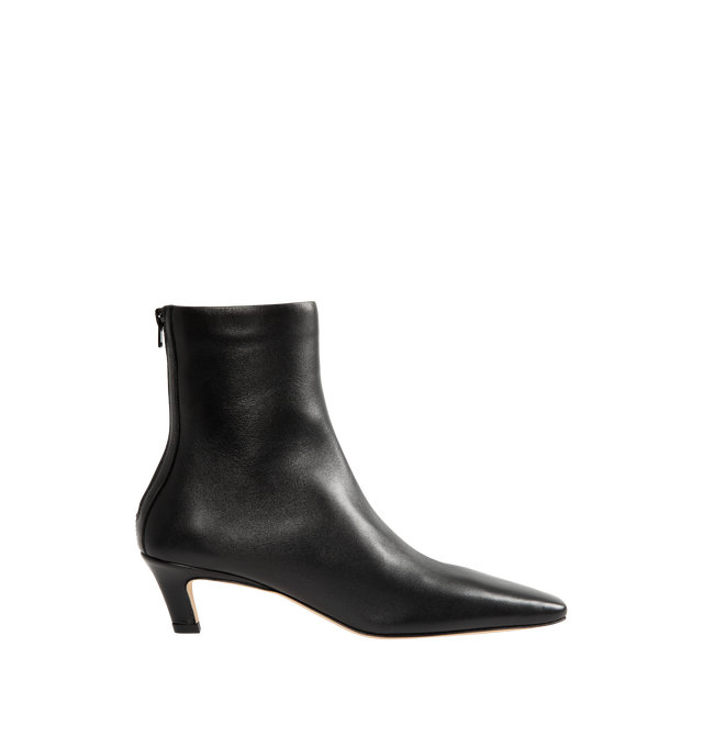 Image 1 of 4 - BLACK - Toteme Women's Nappa Mid Heel Boots are crafted from soft nappa leather and feature a minimalist, unlined construction for a second-skin fit. Designed with a sleek silhouette, they are finished with a squared pointed toe, a slanted 55mm heel, and a branded back zip fastening. Main Material: Goat Skin Leather. Lining: Sheepskin. Sole: Calf Leather. Heel Height: 55mm. Made in Italy.