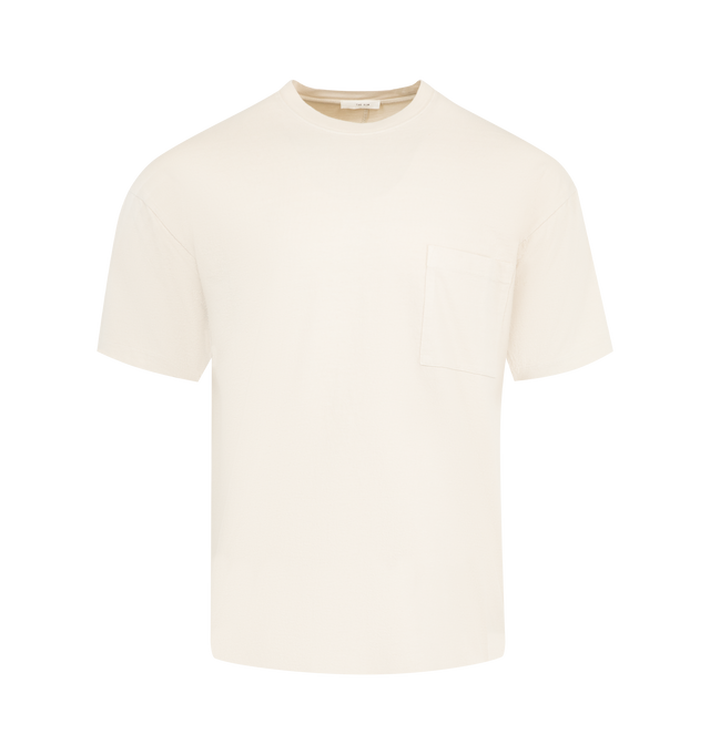 Image 1 of 2 - NEUTRAL - The Row Niels classic crewneck t-shirt in organic cotton jersey with relaxed fit, front patch pocket, and signature center back detail. 100% Cotton. Made in Italy.