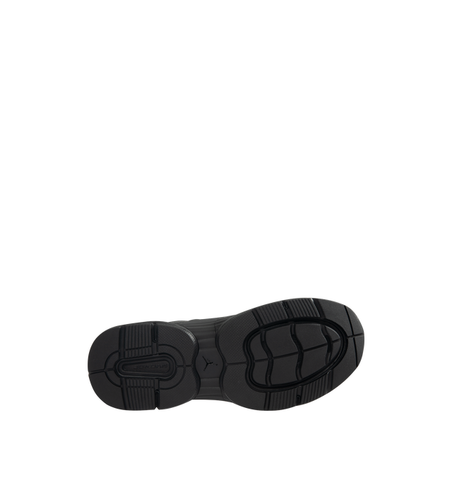 Image 4 of 5 - BLACK - Men's Jordan Trunner O/S SP Sneakers feature a leather upper with synthetic overlays, molded midfoot support wings, and signature Jordan branding for a modern athletic look. These lifestyle sneakers combine responsive Cushlon 3.0 foam cushioning, a lightweight foam midsole, and a durable rubber outsole for exceptional comfort, stability, and everyday traction. Main Material: Leather and Synthetic. Midsole: Foam with Cushlon 3.0 Cushioning. Sole: Rubber.