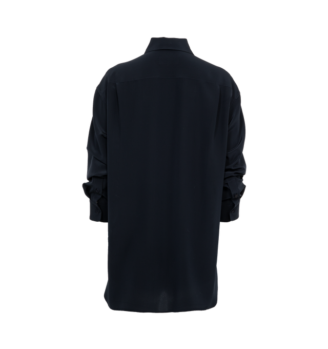 Image 2 of 3 - BLUE - NILI LOTAN Julien Shirt featuring an oversized fit, long-sleeves, button front, dropped shoulder, spread collar, shirred back yoke, curved shirttail hem and tonal buttons. 100% silk. 