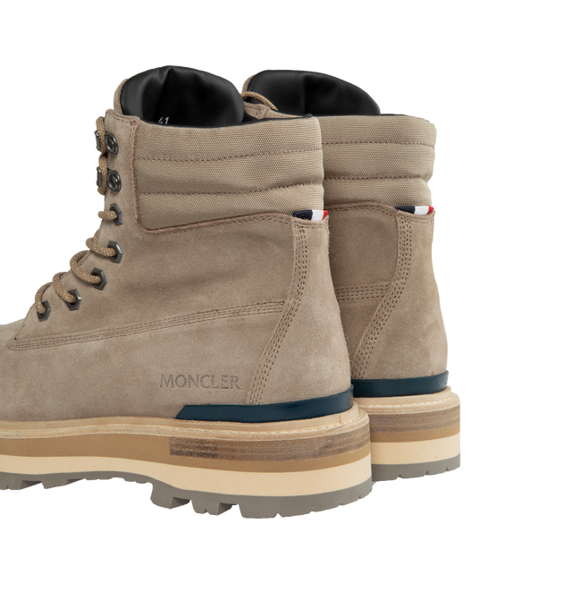 Image 3 of 4 - NEUTRAL - MONCLER Peka Trek Boots featuring suede and nylon upper, leather lining insole, lace closure, leather welt, micro rubber midsole and vibram rubber tread. Sole height 5.5 cm. 100% polyamide/nylon. Lining: cow. Sole: 100% elastodiene. 