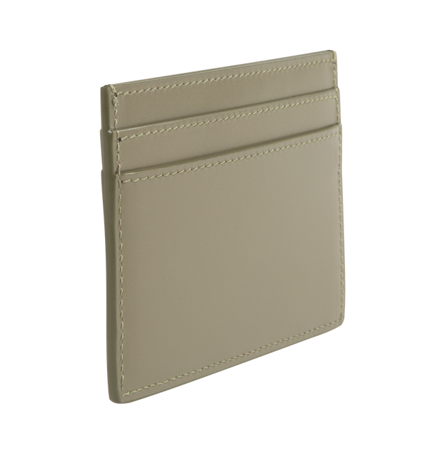 Image 2 of 3 - GREEN - SAINT LAURENT Card Case featuring Saint Laurent Paris signature, leather lining, bronze-tone hardware and five card slots. 4.1" x 3" x 0.2". Calfskin. Made in Italy.