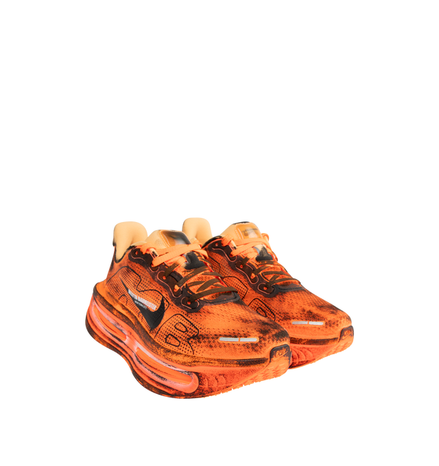 Image 2 of 5 - ORANGE - NIKE Vomero Premium x Melitta Baumeister Sneaker featuring upper with a flaming orange hue, layered with heavy black distressing for a crinkled, heat-treated look on every panel, enlarged AIR lettering and black Swoosh.