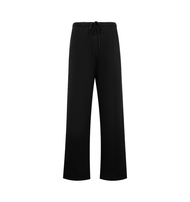 Image 1 of 3 - BLACK - FEAR OF GOD ESSENTIALS Signature Lounge Sweatpant featuring heavy 480GSM core fleece, oversized silhouette, Essentials signature logo embroidered on the leg, front leg seam, encased elastic waistband with elongated drawcords, side-seam pockets and an Essentials signature label at the center front. 80% cotton, 20% polyester.
