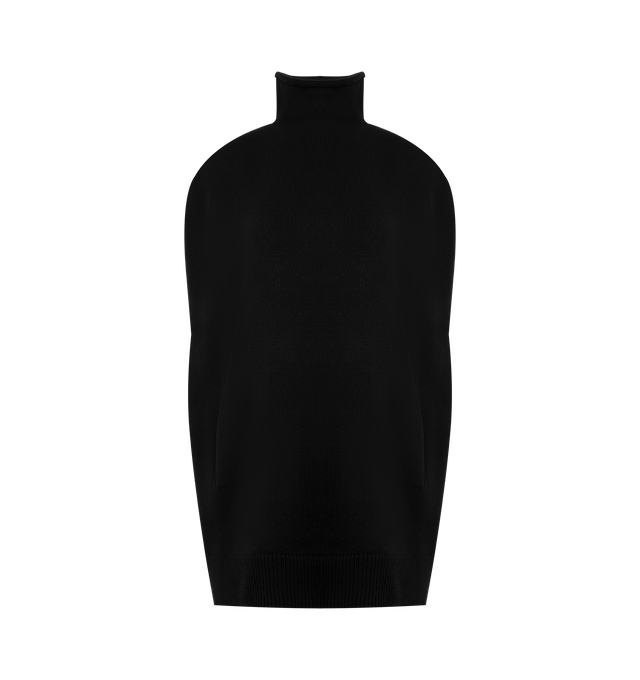 Image 1 of 2 - BLACK - THE ROW Meo Turtleneck Top featuring sculptural sweater vest in soft midweight cashmere with rolled turtleneck, side back armhole slits and seamless kangaroo pocket. 100% cashmere. Made in Italy.