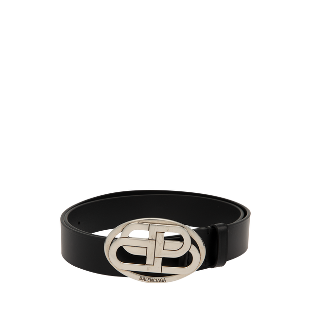 Image 1 of 2 - BLACK - Balenciaga Belt is crafted from natural calfskin leather. Features an aged-silver interlocked BB logo buckle, engraved Balenciaga logo, five adjustment holes, and a tonal leather keeper loop. Main Material: 100% Calf Leather. Made in Italy.