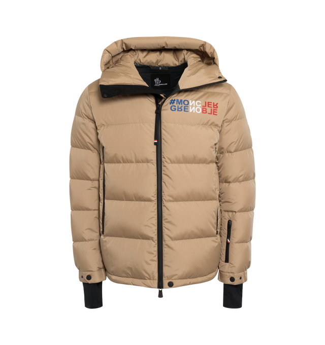 Image 1 of 3 - BROWN - MONCLER GRENOBLE ISORNO JACKET featuring micro ripstop lining, down-filled, adjustable hood with two-layer technical nylon lining, embossed logo, YKK AquaGuard Highly Water Resistant zipper closure, external pockets with YKK AquaGuard Highly Water Resistant zipper closure, internal phone pocket, ski pass pocket, windproof powder skirt, stretch jersey cuffs and adjustable hem with drawstring fastening. 100% polyamide/nylon. 90% down, 10% feather. 