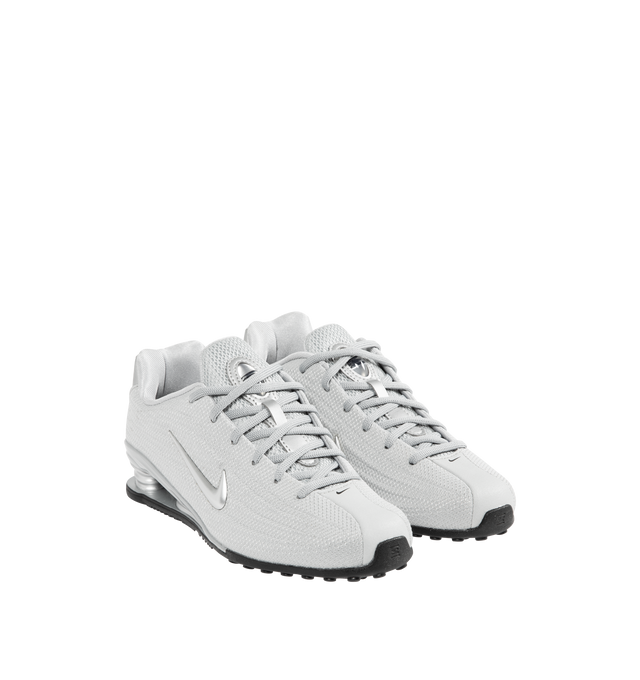 Image 2 of 5 - SILVER - NIKE Shox Z Sneaker featuring a slim, low-profile shape, textile upper, synthetic leather accents, Nike Shox columns, circular Waffle outsole, foam midsole and rubber outsole.