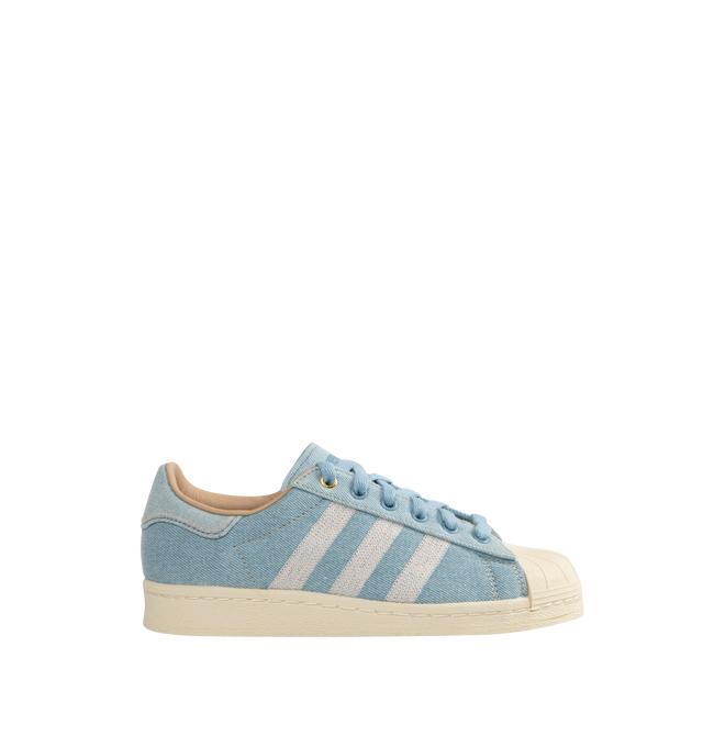 Image 1 of 5 - BLUE - Adidas Superstar Sneakers 82 (Mens) are a lace-up, low-top style with a shell toe and heel tab, canvas uppers with suede details, and premium rubber outsoles. Unisex style in men's sizing. Made in Indonesia.