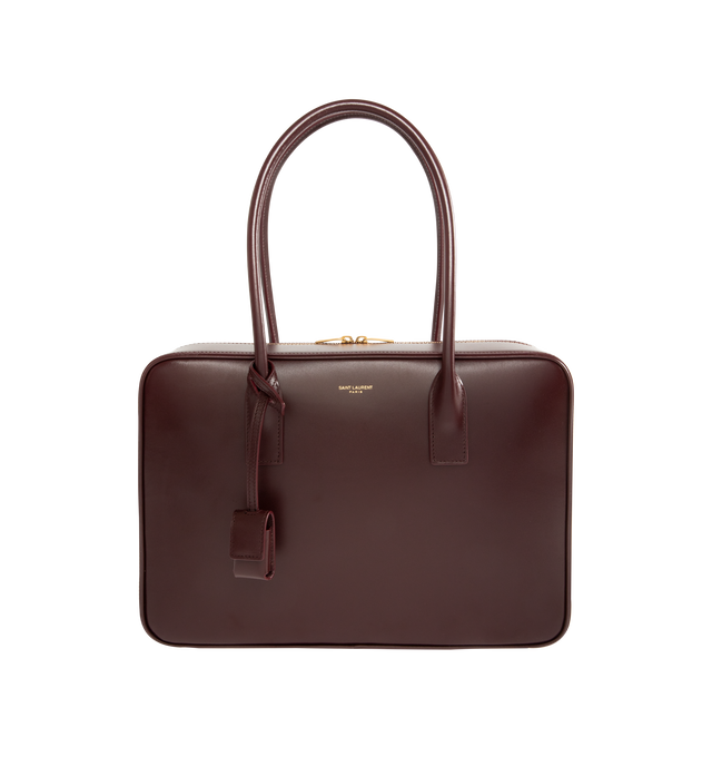 Image 1 of 3 - RED - SAINT LAURENT Sac De Jour Bauletto Bag crafted in smooth leather featuring a wide double-zip opening, long handles, leather lining, bronze-tone hardware, zip closure, one zip pocket and one flat pocket. 13" x 9.3" x 3.9". Calfskin. Made in Italy.