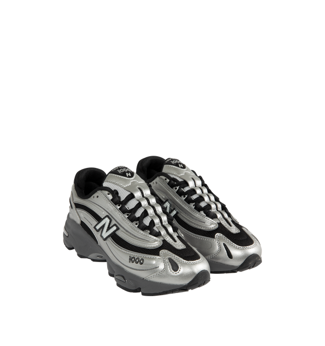 Image 2 of 5 - SILVER - NEW BALANCE 1000 Sneaker featuring combination polyurethane and ABZORB midsole, with ABZORB cushioning at heel and forefoot, stability web, sculpted midsole details, embroidered details, reflective accents, rubberized N logo with transparent outline and external lacing structure with nylon eyelets.