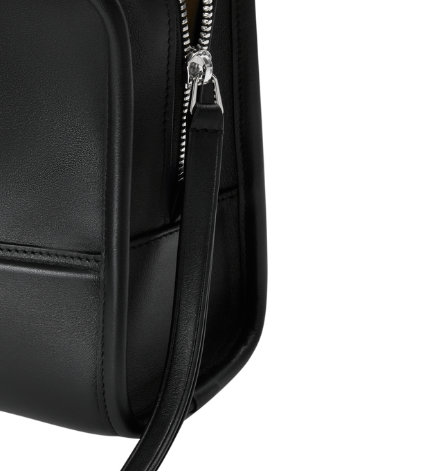 Image 13 of 16 - BLACK - Loewe Small Amazona 180 Bag in leather features a relaxed silhouette anchored by a single toron top handle, designed to be carried open, while a concealed closure secures the main compartment, three carry options: short handle, removable shoulder strap and crossbody, zip closure with two leather zip pullers, two compartments, main compartment closed with magnetic closure, internal flat pocket, left side d-ring for customization, nappa lambskin lining, and embossed double L branding.