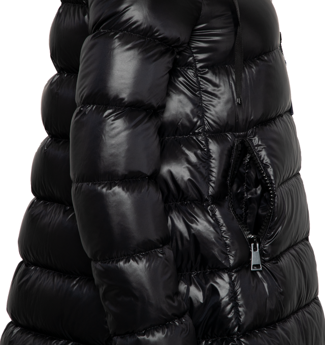 Image 3 of 3 - BLACK - MONCLER Suyen Long Down Jacket featuring nylon lger brillant lining, down-filled, adjustable hood, zipper closure, zipped pockets and felt logo patch. 100% polyamide/nylon. Padding: 90% down, 10% feather. 