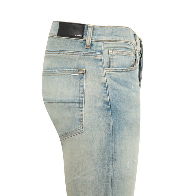 Image 3 of 3 - BLUE - AMIRI MX1 Ultrasuede Jeans featuring Italian stretch denim, hand-distressed and repaired with pleated suede, five-pocket detailing and zip fly with button closure. 92% cotton, 6% elastomultiester, 2% elastane. Made in the USA.