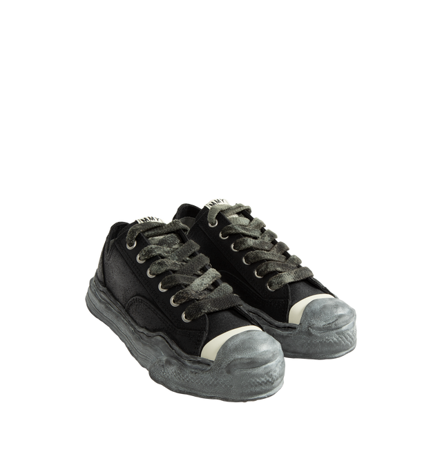 Image 2 of 5 - BLACK - Maison Mihara Yasuhiro Hank OG Sole Waxed Low-Top Sneakers are crafted from wax-treated polyurethane and feature the brand's signature sculpted OG sole, originally molded from clay by the designer. Designed with the HANK silhouette, this low-top sneaker combines a distinctive waxed finish that creates unique shine and texture with the label's signature handcrafted sole construction. Main Material: Polyurethane Upper. Sole: Rubber.
