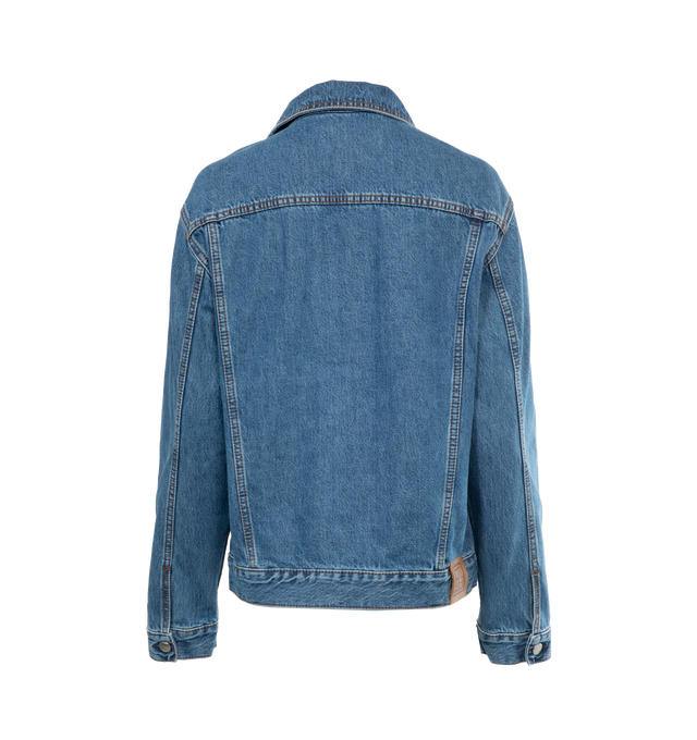 Image 2 of 3 - BLUE - TOTEME Classic Denim Jacket featuring a boxy silhouette finished with silver-tone buttons, flap and welt pockets, and a back monogram leather patch. 100% cotton organic. 