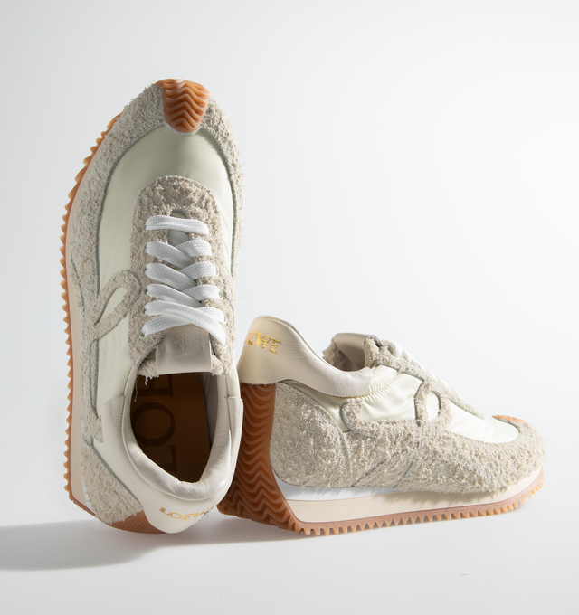 Image 6 of 6 - NEUTRAL - LOEWE Flow Runner featuring lace-up runner sneaker in nylon and iconic brushed suede, featuring an L monogram on the quarter, textured honey-coloured rubber outsole extends to the toe-cap and on to the back of the heel and gold embossed LOEWE logo on the backtab. Brushed suede/nylon. Made in Italy. 