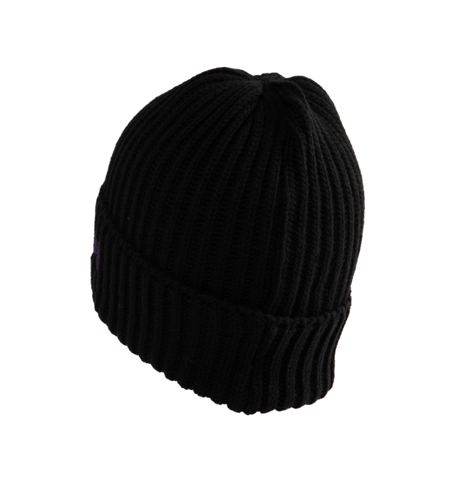 Image 2 of 3 - BLACK - Needles Watch Cap is crafted from Shetland wool and features a classic watch cap silhouette with the brand's signature embroidered Papillon motif at the front. Designed for warmth and everyday wear, the soft yet durable knit benefits from the natural insulating properties of Shetland wool, which helps retain heat while remaining comfortable. Main Material: 100% Wool. Made in Japan.