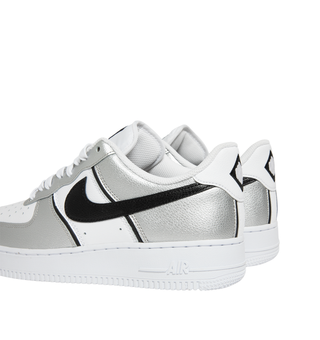 Image 3 of 5 - SILVER - Nike Men's Air Force 1 '07 LV8 sneaker features a padded collar, leather and textile upper, textile lining and rubber sole.