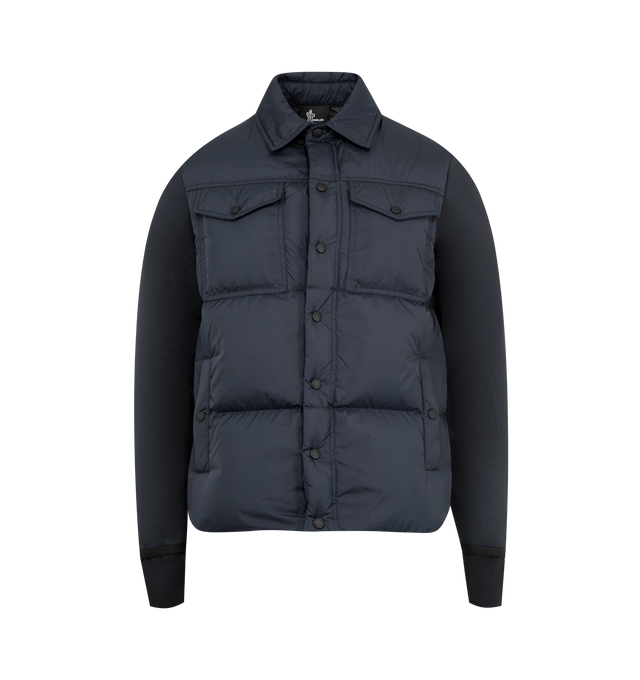 Image 1 of 3 - BLUE - MONCLER GRENOBLE Padded Zip-Up Cardigan featuring down-filled rainwear front, padded, gauge 14, water-repellent look zipper closure, pockets with snap button closure and stretch jersey wrist gaiters. 100% polyamide/nylon. 100% polyester. Padding: 90% down, 10% feather. Made in Moldova.