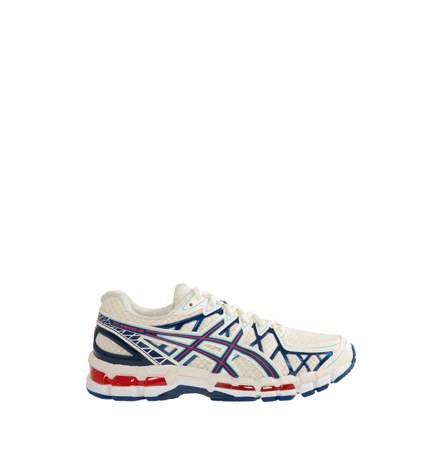 Image 1 of 5 - WHITE - ASICS GEL-Kayano 20 featuring FLUIDFIT technology cage, TRUSSTIC support system, dual GEL technology inserts, double-layer mesh construction, synthetic fiber outer, rubber sole, grid-like patterns, glossy finish, lace-up fastening, tongue pull loop and logo detail. Unisex style in men's sizing.