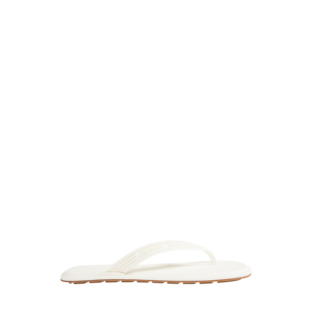 Image 1 of 4 - WHITE - BOTTEGA VENETA Sampieri Thong featuring rubber thong sandal with leather insole. Lining: lambskin. Rubber-injected leather outsole. Thermoplastic polyurethane. Made in Italy.