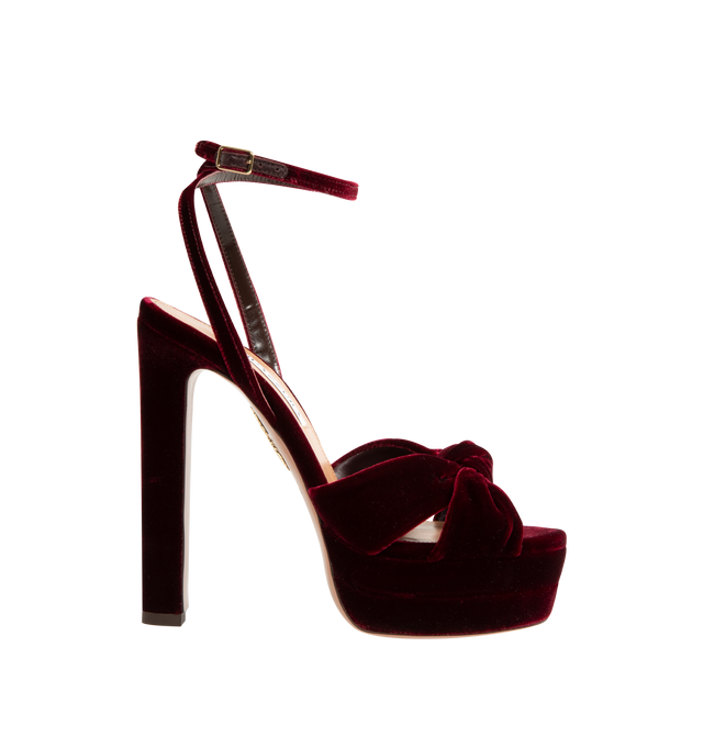 Image 1 of 4 - RED - Aquazzura Women's Cupid Plateau 130 Velvet Platform Heels are crafted from velvet and feature crossover straps with a knotted detail at the toe, an adjustable buckle ankle strap, and a round open-toe silhouette. Designed with a statement platform heel, this elevated sandal is finished with a leather lining and sole. Upper: Velvet. Lining: Leather. Sole: Leather. Heel Height: 130 mm / 5.1 in. Closure: Adjustable Buckle Ankle Strap. Toe: Round Open Toe. Made in Italy.
