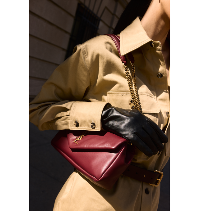Image 5 of 5 - RED - SAINT LAURENT Calypso padded shoulder bag featuring snap button closure and one zip pocket. Chain drop 9.4". Dimensions: 2.8 x 5.5 x 10.6 inches. 100% leather. Made in Italy.  
