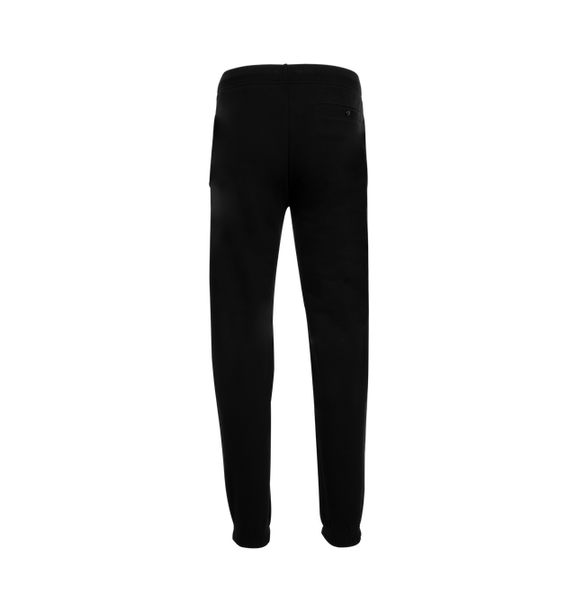 Image 2 of 3 - BLACK - MONCLER Logo Patch Cotton Sweatpants featuring cotton fleece, waistband with drawstring fastening, side pockets and back pocket with snap button closure. 100% cotton. Made in Turkey.