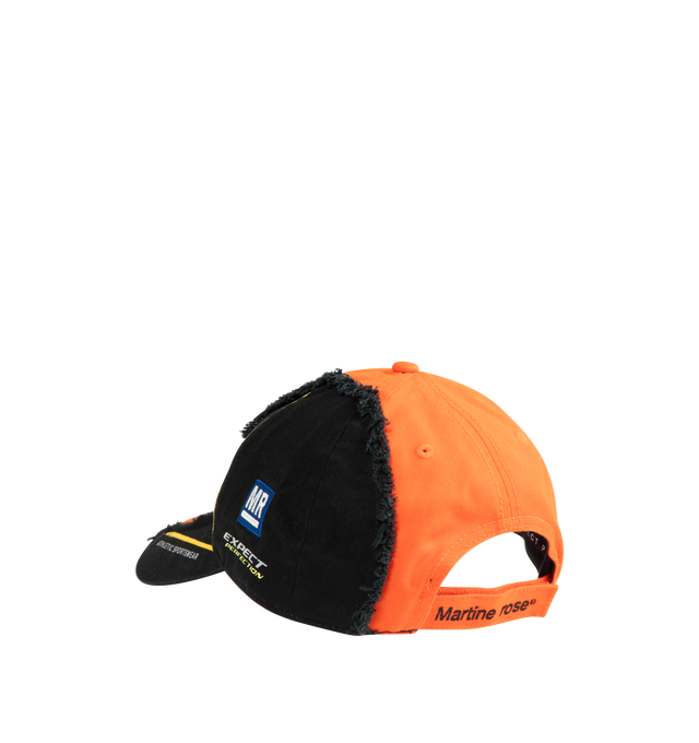 Image 2 of 2 - ORANGE - MARTINE ROSE Collage Cap featuring classic six-panel construction, curved brim, logo embroidery at front, half bright orange base, all-over prints and patches, distressed fabric and adjustable back with velcro fastening. 100% cotton. Made in Italy.