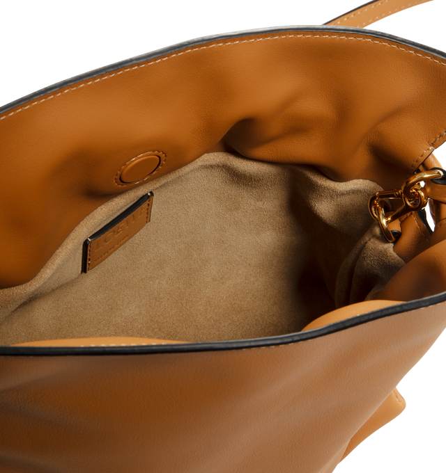 Image 3 of 3 - BROWN - LOEWE Flamenco Mini Napa Drawstring Clutch Bag featuring suede lining, coiled knot drawstring and hidden magnetic closure. 7"H x 9.4"W x 3.5"D. Convertible shoulder strap: 11 1/2" 23 1/2" drop. Nappa calf. Made in Spain.
