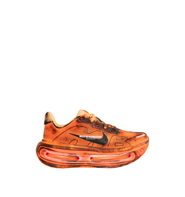 Image 1 of 5 - ORANGE - NIKE Vomero Premium x Melitta Baumeister Sneaker featuring upper with a flaming orange hue, layered with heavy black distressing for a crinkled, heat-treated look on every panel, enlarged AIR lettering and black Swoosh.