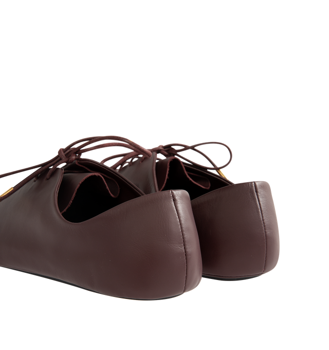 Image 3 of 5 - RED - Loewe Womens Nappa Calf Lace-Up Shoes are crafted from nappa calfskin. Features a lace-up closure, extra padding, asymmetric toe shape, tonal laces with metallic tips, metallic Pebble with engraved Anagram detail on the bottom lace, lambskin lining, printed LOEWE insole, and injected rubber outsole with cut-out Anagram signature. Main Material: Nappa Calf. Made in Italy.