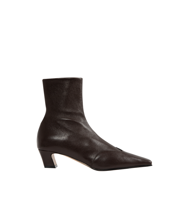 Image 1 of 4 - BROWN - KHAITE Nevada Stretch Low Boot featuring mid-calf urban cowboy boot, calfskin wingtip traced by tonal topstitching, pointed toe and side zipper closure. Heel Height: 1.8 in. 100% lambskin. Made in Italy.