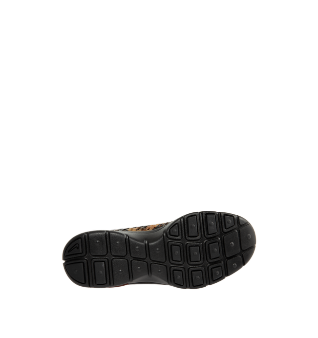 Image 4 of 6 - BROWN - Nike Women's Rejuven8 Run Sneakers feature a black and brown tortoise shell-patterned synthetic upper with a removable mesh bootie and lightly padded collar. Flat laces, heel and tongue pull tabs, a mini Swoosh at the back heel, and Swoosh branding on the sole unit complete the design. ReactX foam provides responsive cushioning, while a rubber outsole offers durable traction. Upper: Synthetic. Bootie: Mesh. Midsole: ReactX Foam. Sole: Rubber.