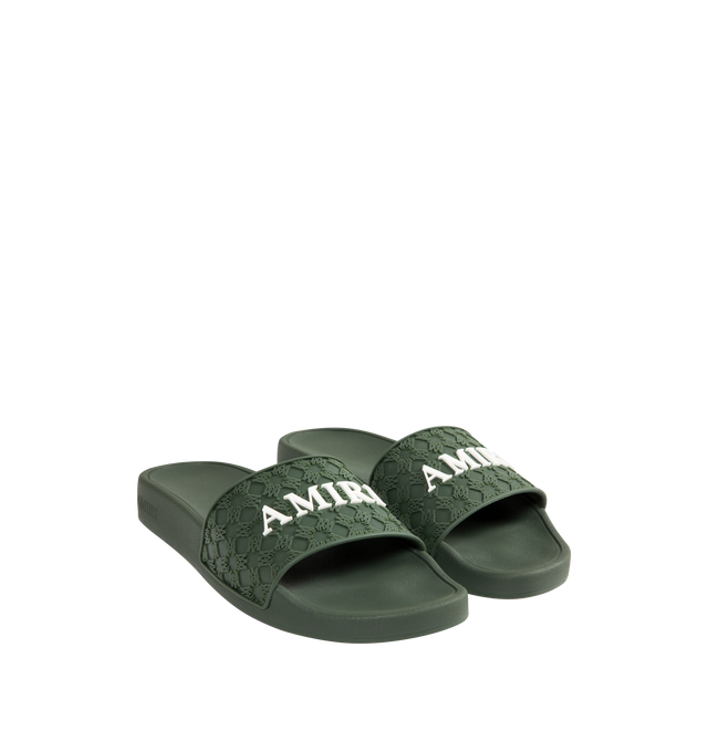 Image 2 of 4 - GREEN - AMIRI MA Quad Pool Slides featuring rubber pool slides, logo pattern embossed throughout, open toe, logo embossed at vamp and outer side, molded rubber footbed and treaded rubber sole. Rubber.