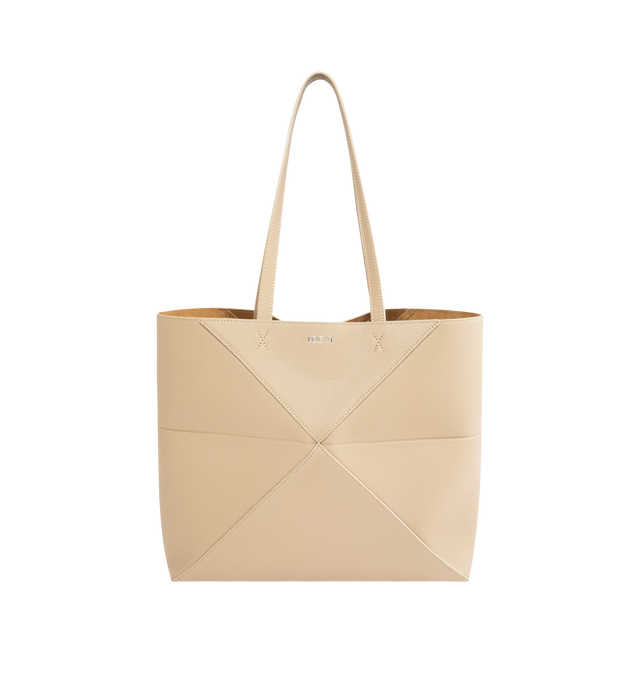 Image 1 of 3 - CHAMPAGNE - LOEWE Medium Horizontal Puzzle Fold Tote in soft grained calfskin featuring a lightweight geometric structure designed to fold completely flat, shoulder or hand carry, detachable inside zipped suede pocket, suede lining and gold embossed LOEWE. Soft grained calf. Strap drop: 27 cm. 29 cm x 31.5 cm x 12.5 cm. Made in Spain.